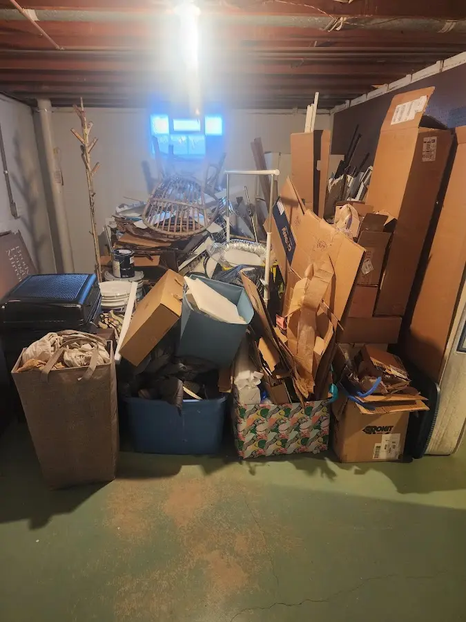 Roll-off dumpster container at job site for Roll Off Dumpster Rental in Kingsford